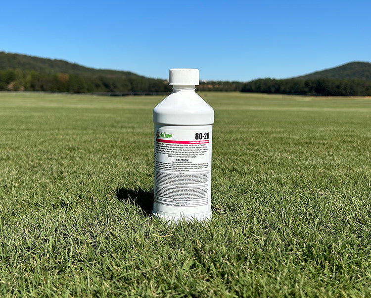 bottle of surfactant to help with herbicide in weed control