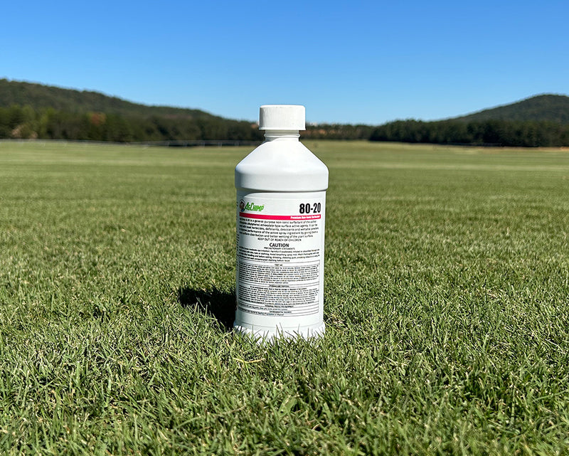 bottle of surfactant to help with herbicide in weed control
