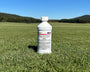 bottle of surfactant to help with herbicide in weed control