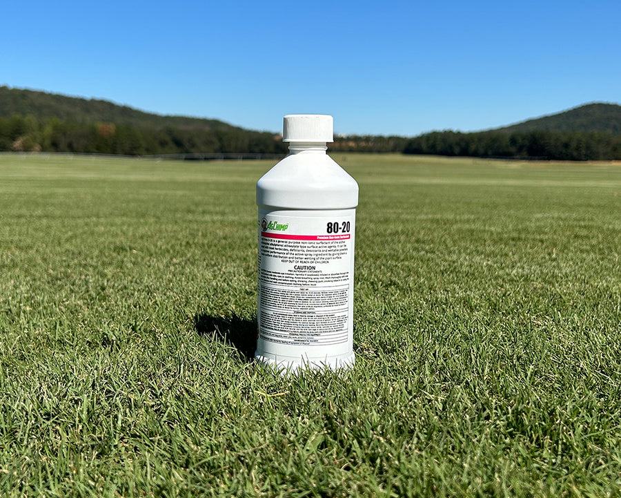bottle of surfactant to help with herbicide in weed control